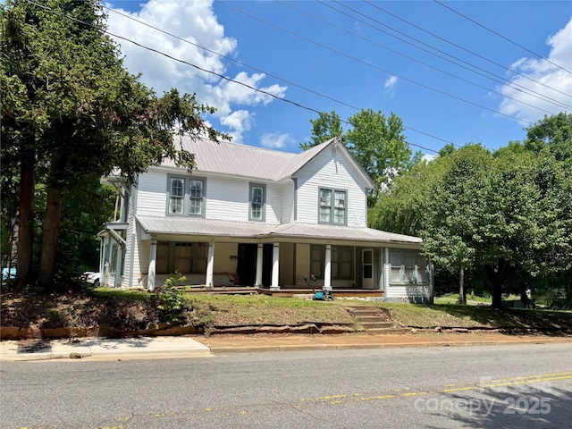 273 E Main Ave, Taylorsville, NC 28681 - farmhouse with metal roof and covered porch