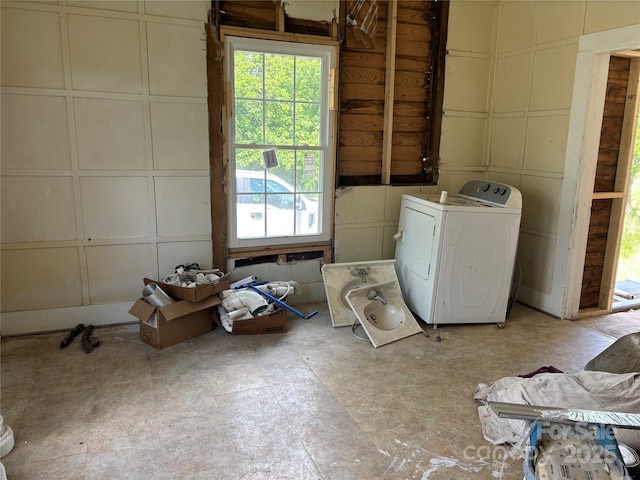 273 E Main Ave, Taylorsville, NC 28681 - washroom featuring washer / dryer and a decorative wall