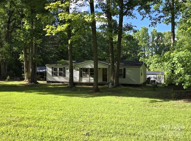 850 Meadowbend Dr, York, SC 29745 - back of house featuring a yard and view of wooded area