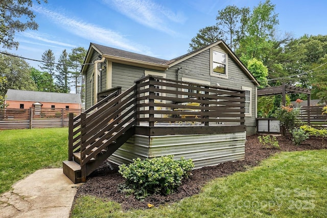 4235 Howie Cir, Charlotte, NC 28205 - view of property exterior featuring a wooden deck and a pergola