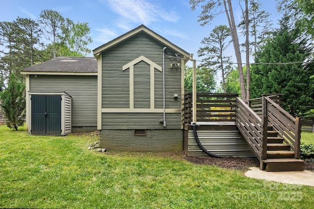4235 Howie Cir, Charlotte, NC 28205 - back of house featuring crawl space, a lawn, a wooden deck, and stairway