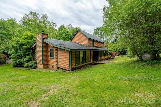 181 Settlers Ln, Waynesville, NC 28785 - back of property with a chimney and a yard