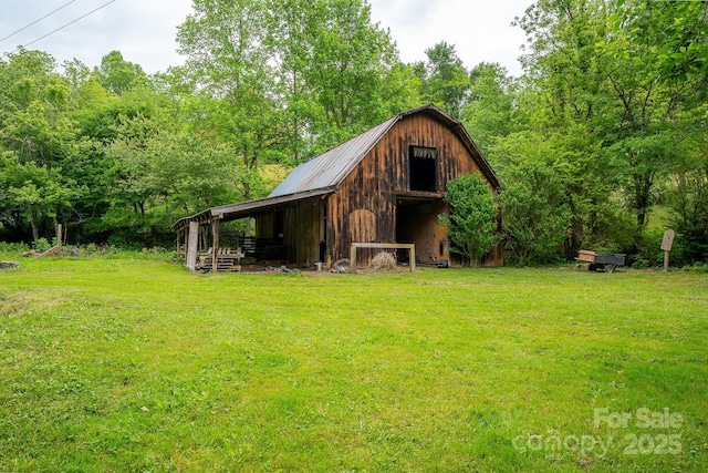 181 Settlers Ln, Waynesville, NC 28785 - view of barn with a yard