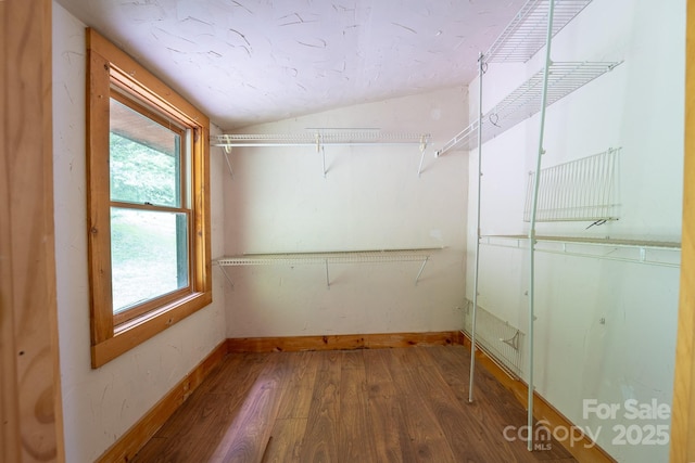 181 Settlers Ln, Waynesville, NC 28785 - walk in closet with wood finished floors and vaulted ceiling