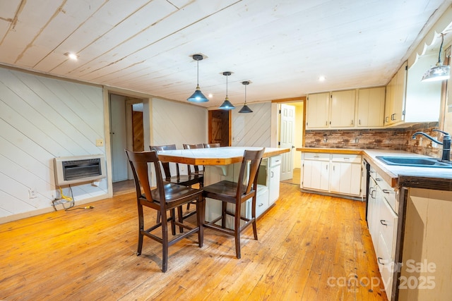 181 Settlers Ln, Waynesville, NC 28785 - kitchen with a sink, heating unit, light wood-style flooring, decorative light fixtures, and wood ceiling