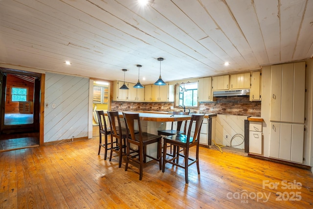 181 Settlers Ln, Waynesville, NC 28785 - dining space with light wood-type flooring and wooden ceiling
