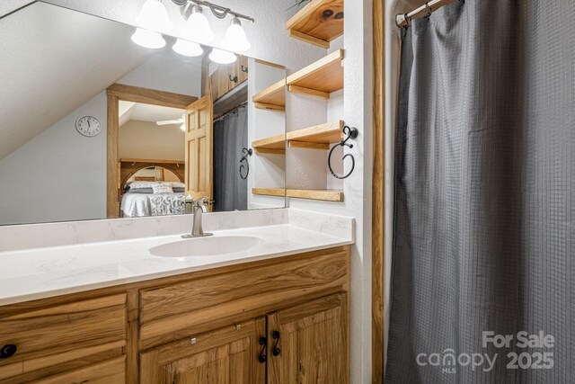 2912 Windswept Ridge Rd, Marshall, NC 28753 - bathroom featuring ensuite bathroom, vanity, and lofted ceiling