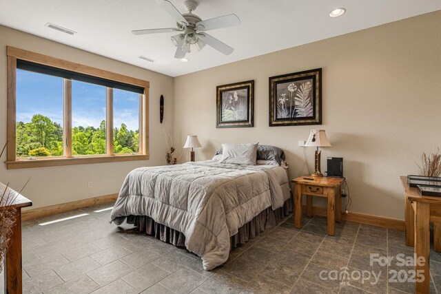 2912 Windswept Ridge Rd, Marshall, NC 28753 - bedroom featuring baseboards, recessed lighting, stone tile flooring, and ceiling fan