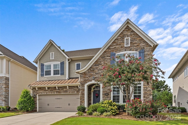 9750 Briarwick Ln, Charlotte, NC 28277 - view of front facade with stone siding, an attached garage, concrete driveway, and a standing seam roof