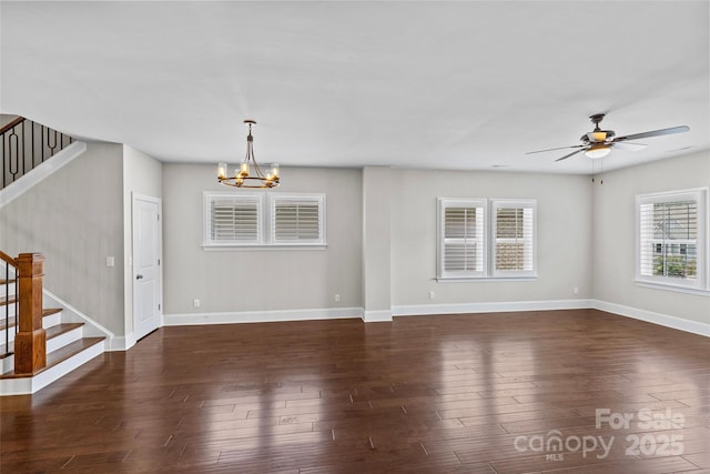 9750 Briarwick Ln, Charlotte, NC 28277 - unfurnished living room with stairway, a chandelier, ceiling fan, and baseboards
