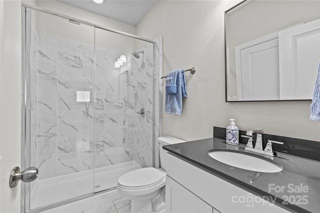 9750 Briarwick Ln, Charlotte, NC 28277 - full bathroom with marble look tiles, a stall shower, vanity, and toilet