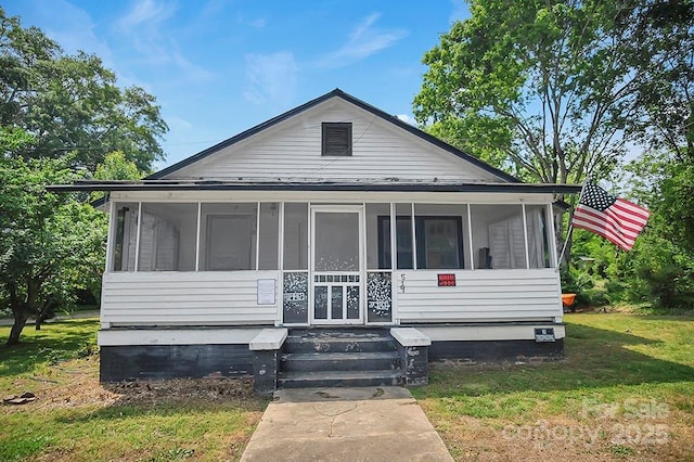 514 S Martin St, Shelby, NC 28150 - view of front of property with a sunroom and a front lawn