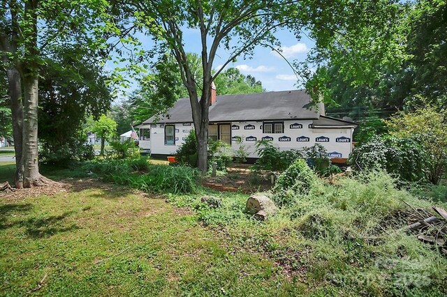 514 S Martin St, Shelby, NC 28150 - back of house featuring a lawn