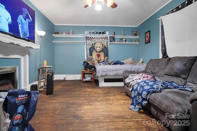 514 S Martin St, Shelby, NC 28150 - bedroom with ornamental molding, wood finished floors, and ceiling fan