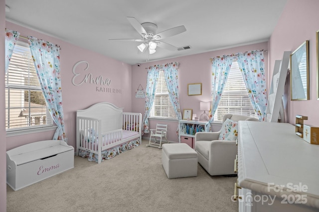 6119 Castlecove Rd, Charlotte, NC 28278 - bedroom featuring multiple windows, a nursery area, carpet, and ceiling fan