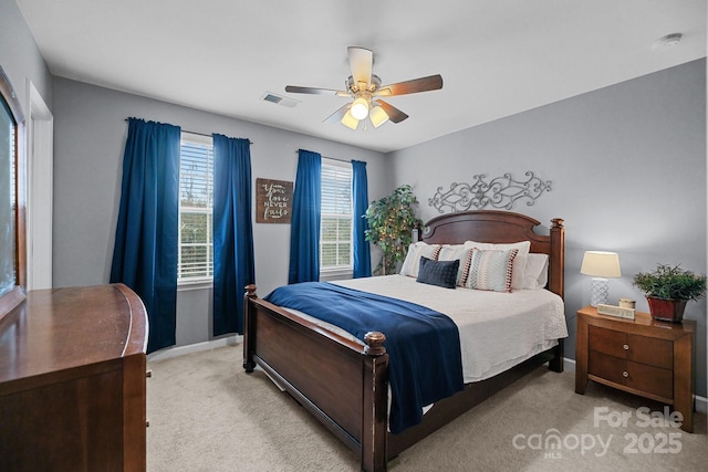 6119 Castlecove Rd, Charlotte, NC 28278 - bedroom with light colored carpet, baseboards, and a ceiling fan