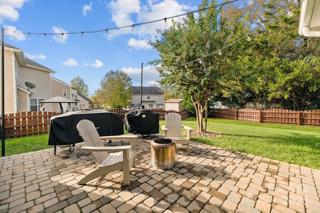 6119 Castlecove Rd, Charlotte, NC 28278 - view of patio / terrace with a fire pit, a shed, an outdoor structure, and a residential view