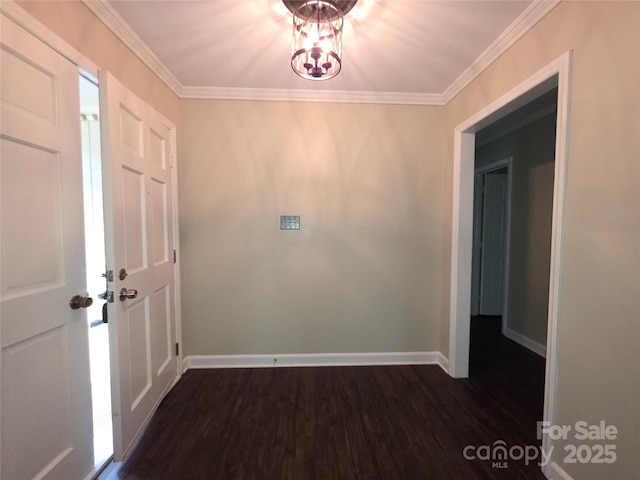 3316 Mckee Rd, Charlotte, NC 28270 - entryway with dark wood finished floors, a chandelier, baseboards, and crown molding
