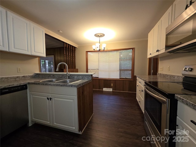 3316 Mckee Rd, Charlotte, NC 28270 - kitchen featuring stainless steel appliances, a sink, a chandelier, crown molding, and dark wood-style flooring