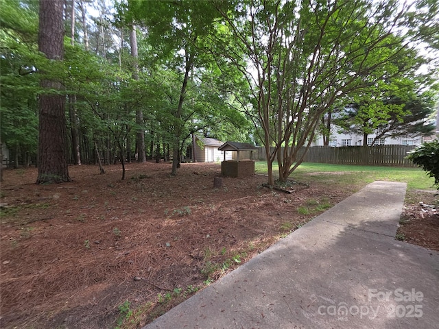 3316 Mckee Rd, Charlotte, NC 28270 - view of yard with fence and an outbuilding