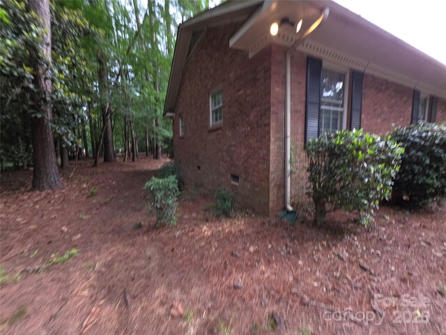 3316 Mckee Rd, Charlotte, NC 28270 - view of property exterior featuring crawl space and brick siding