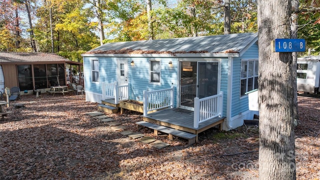 108 Sailors Ct Unit 108B, Mount Gilead, NC 27306 - view of outbuilding with a sunroom