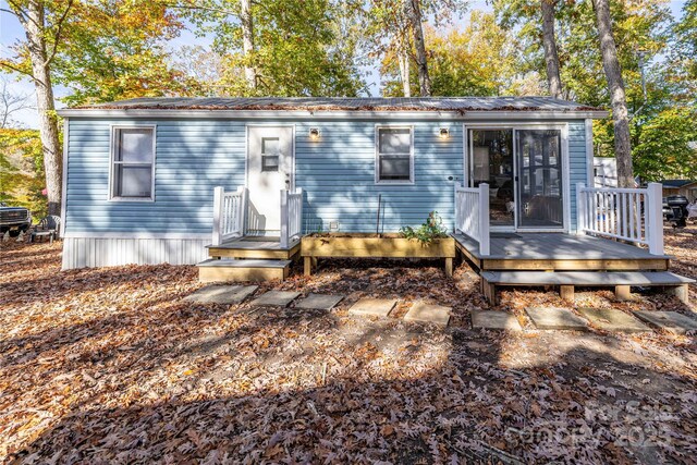 108 Sailors Ct Unit 108B, Mount Gilead, NC 27306 - back of house featuring a deck