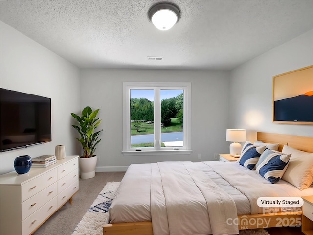 2532 Steeplechase Rd, Gastonia, NC 28056 - bedroom with carpet, a textured ceiling, and baseboards