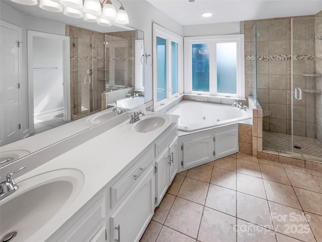 2532 Steeplechase Rd, Gastonia, NC 28056 - full bathroom featuring a shower stall, a jetted tub, tile patterned flooring, and double vanity