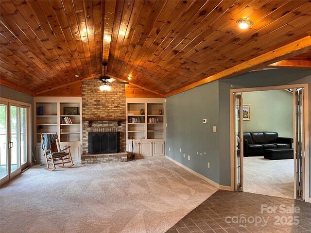 1351 Hardin Rd, Dallas, NC 28034 - unfurnished living room featuring carpet floors, ceiling fan, vaulted ceiling, a fireplace, and wooden ceiling