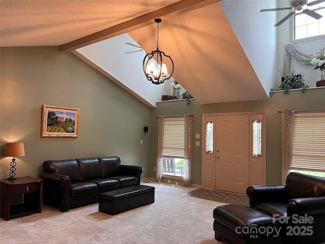 1351 Hardin Rd, Dallas, NC 28034 - living area featuring high vaulted ceiling, a ceiling fan, carpet floors, beamed ceiling, and a chandelier