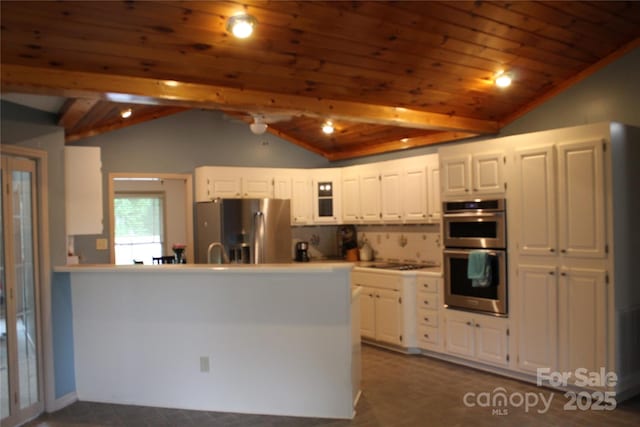 1351 Hardin Rd, Dallas, NC 28034 - kitchen featuring stainless steel appliances, vaulted ceiling, white cabinets, a peninsula, and wood ceiling
