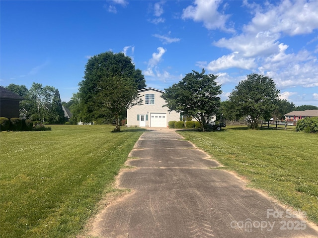 1351 Hardin Rd, Dallas, NC 28034 - obstructed view of property with asphalt driveway, a front lawn, and an attached garage