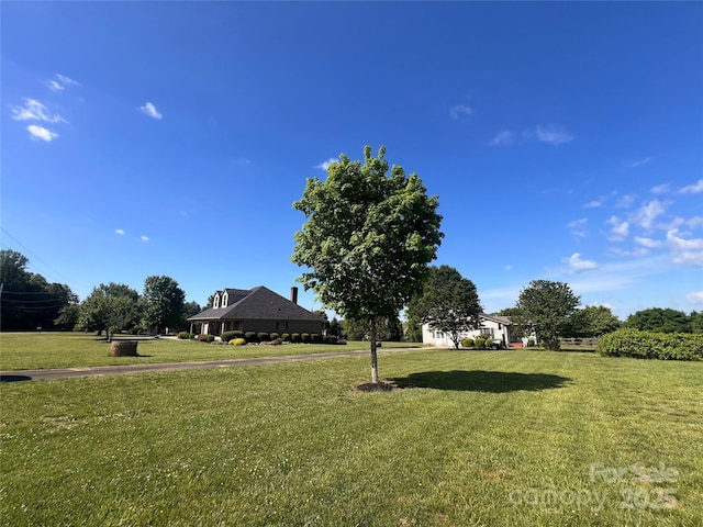 1351 Hardin Rd, Dallas, NC 28034 - view of grassy yard featuring asphalt driveway