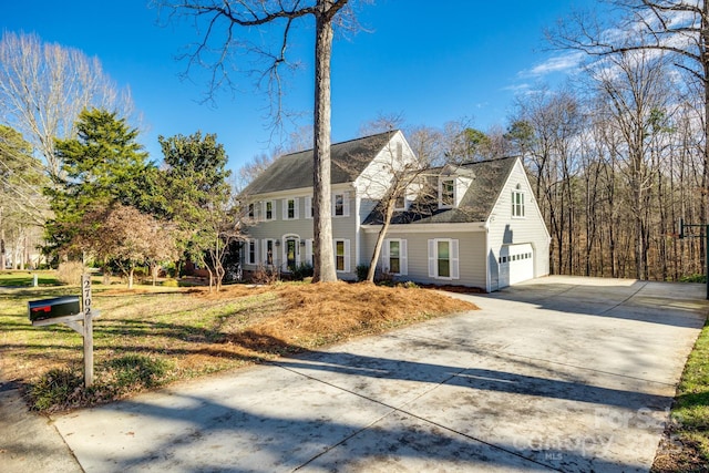 2702 Oxborough Dr, Matthews, NC 28105 - view of front of property featuring concrete driveway, a garage, and a front yard