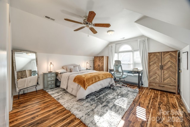 2702 Oxborough Dr, Matthews, NC 28105 - bedroom with vaulted ceiling, wood finished floors, and a ceiling fan