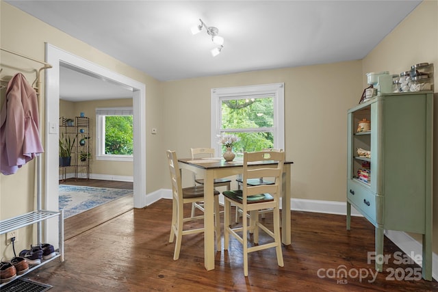 108 Greenwood Ave, Belmont, NC 28012 - dining area featuring baseboards and dark wood-style floors
