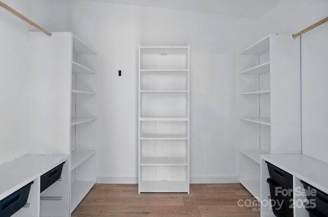 12382 Ritchie Rd, Midland, NC 28107 - spacious closet with wood finished floors