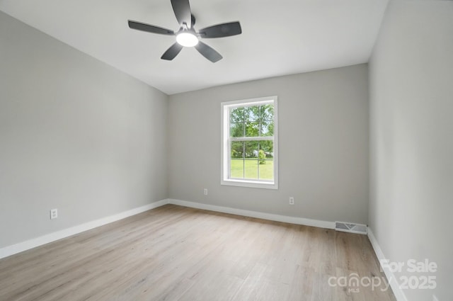 12382 Ritchie Rd, Midland, NC 28107 - spare room with light wood finished floors, baseboards, and ceiling fan