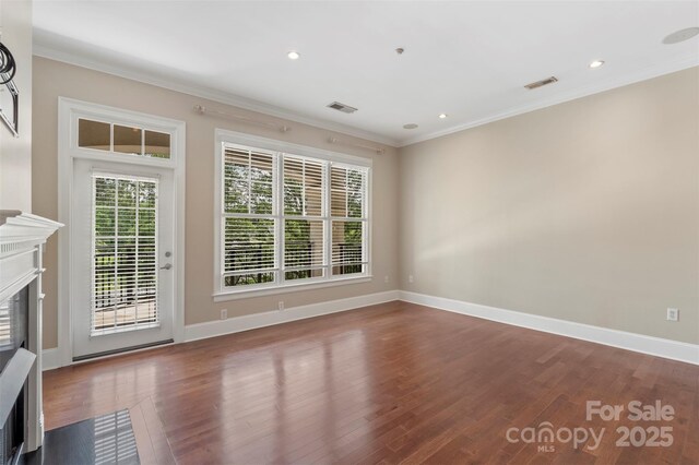 5425 Closeburn Rd Unit 208, Charlotte, NC 28210 - unfurnished living room featuring a premium fireplace, wood finished floors, ornamental molding, baseboards, and recessed lighting