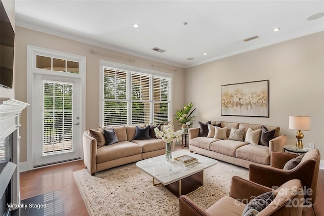 5425 Closeburn Rd Unit 208, Charlotte, NC 28210 - living room with ornamental molding, wood finished floors, a fireplace with flush hearth, and recessed lighting