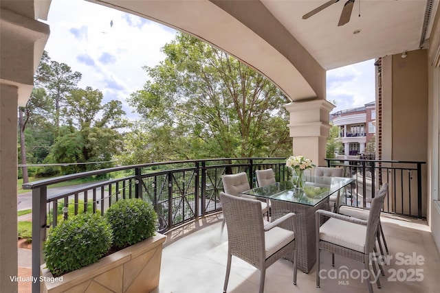 5425 Closeburn Rd Unit 208, Charlotte, NC 28210 - balcony featuring a ceiling fan and outdoor dining area