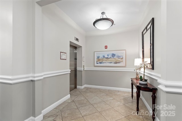 5425 Closeburn Rd Unit 208, Charlotte, NC 28210 - hall with elevator and light tile patterned floors