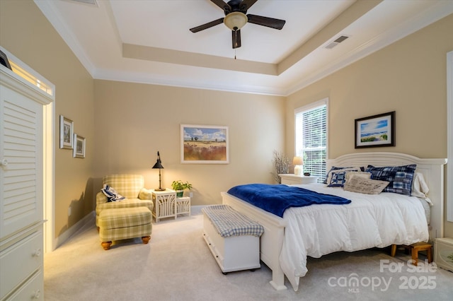 8818 Artesa Mill Ln, Charlotte, NC 28214 - bedroom featuring carpet floors, a tray ceiling, ceiling fan, and ornamental molding