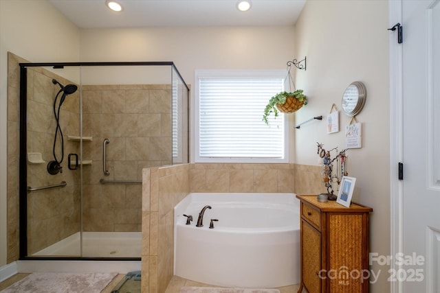 8818 Artesa Mill Ln, Charlotte, NC 28214 - full bath with a stall shower, a garden tub, and recessed lighting
