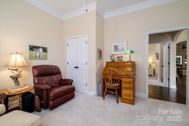 8818 Artesa Mill Ln, Charlotte, NC 28214 - living area with carpet flooring, ornamental molding, and baseboards