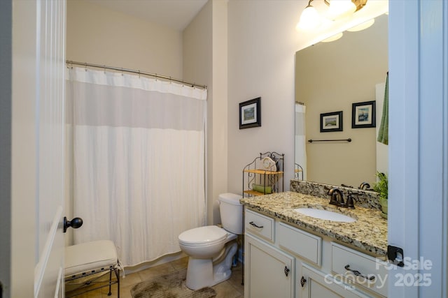8818 Artesa Mill Ln, Charlotte, NC 28214 - bathroom featuring vanity, toilet, and tile patterned floors