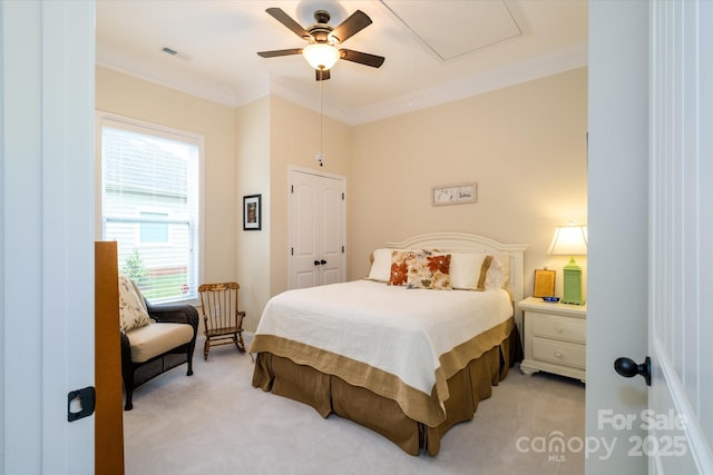 8818 Artesa Mill Ln, Charlotte, NC 28214 - bedroom featuring light colored carpet, ornamental molding, ceiling fan, and attic access