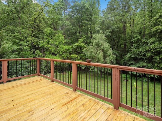 deck featuring a yard