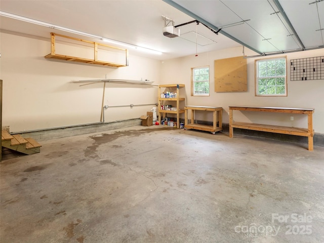 garage featuring a garage door opener